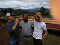 Tesfaye with Alan and Will Suke Quto Natural Dried Coffee Station Guji Ethiopia